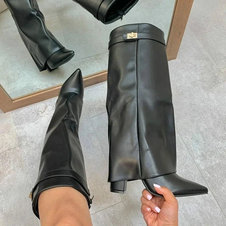 Fashionable black suede-like thigh-high boots with buckle accents