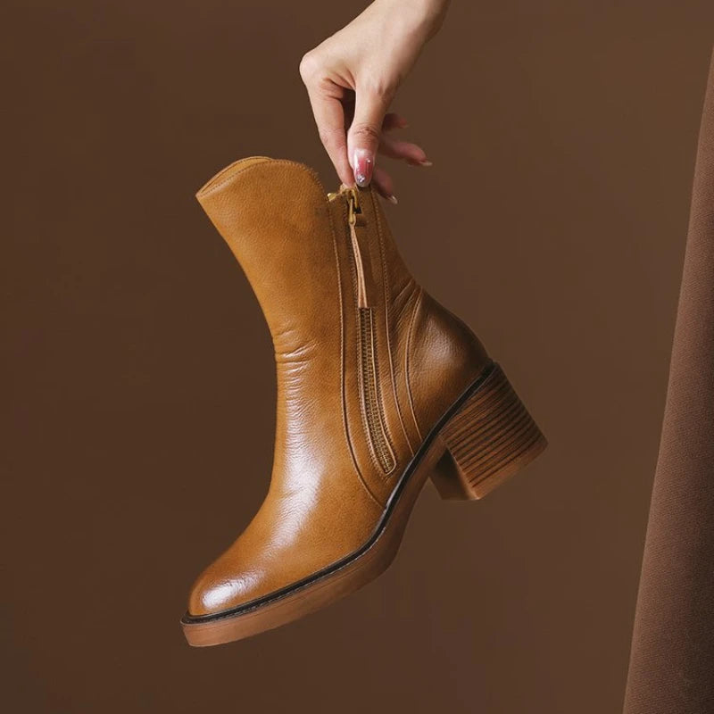 Women's black leather zip ankle boots, block heel, side view for autumn/winter fashion