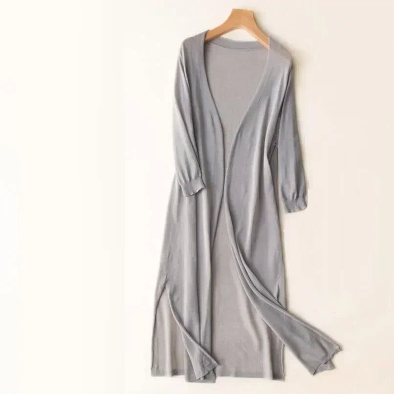 Open front longline cardigan in a deep blue, showing its relaxed drape and comfortable fit