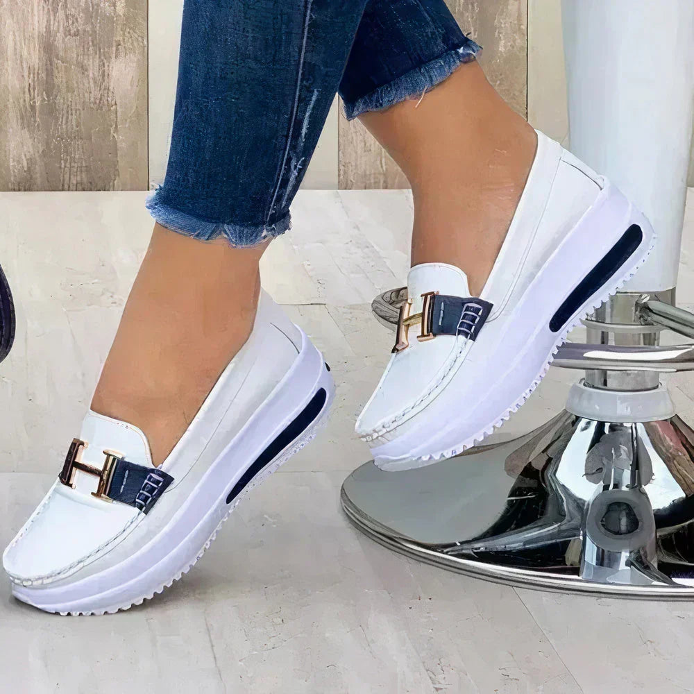 Comfortable women's platform slip-on loafers. Versatile modern footwear for casual or dressy outfits.