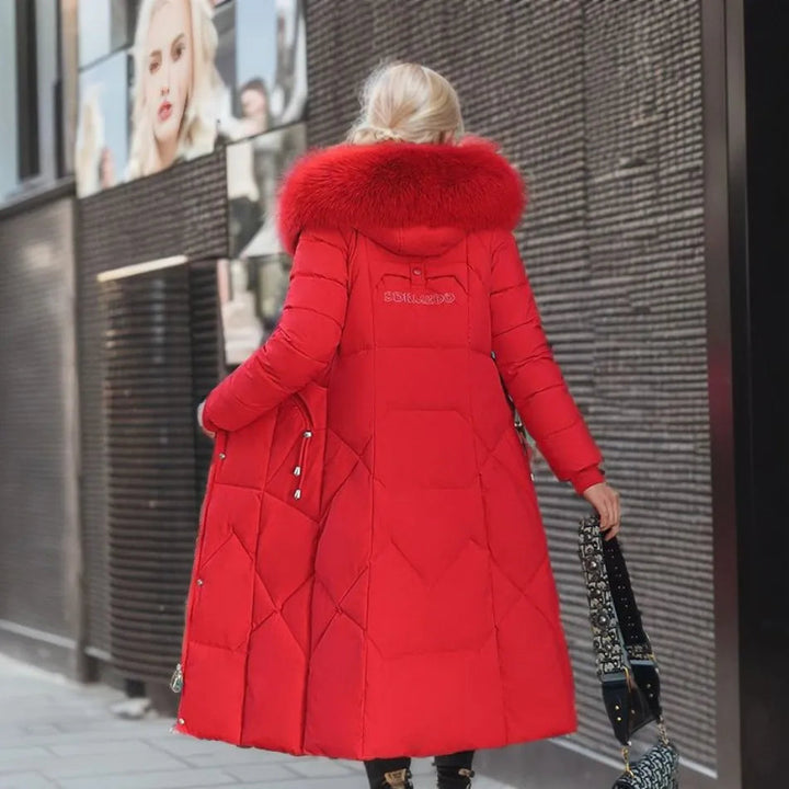 Women's classic black quilted winter jacket with an attached hood, perfect for everyday wear
