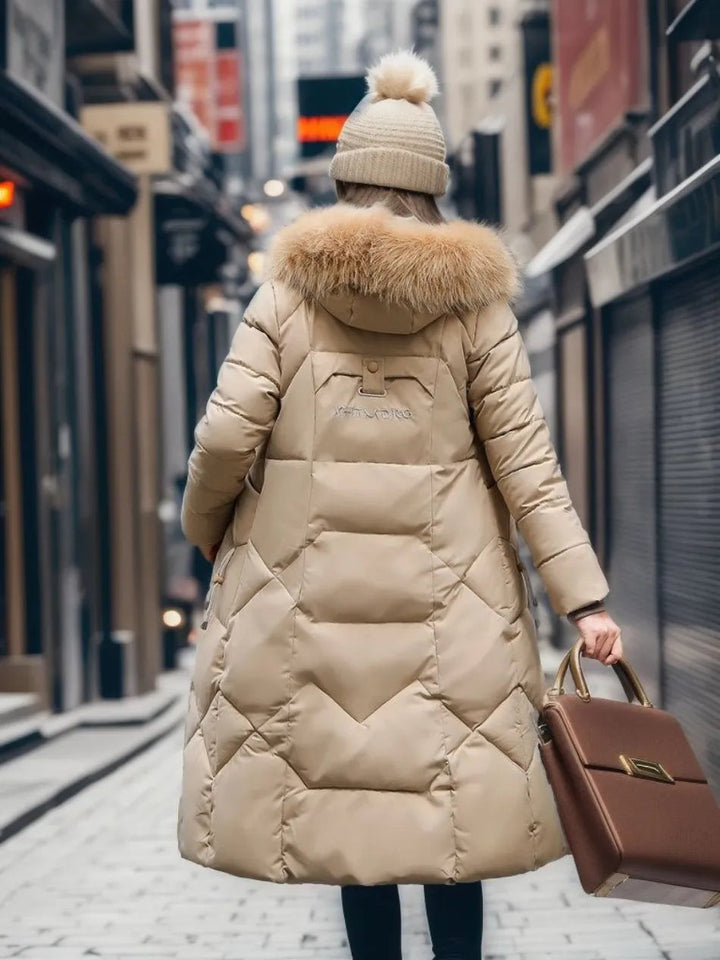 Women's cold weather essential: black quilted coat with a fully lined and trimmed hood