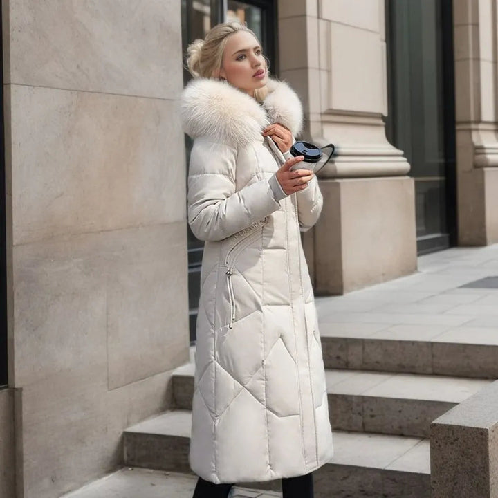 Stylish women's long quilted winter coat, hooded, perfect for warmth and outdoor activities