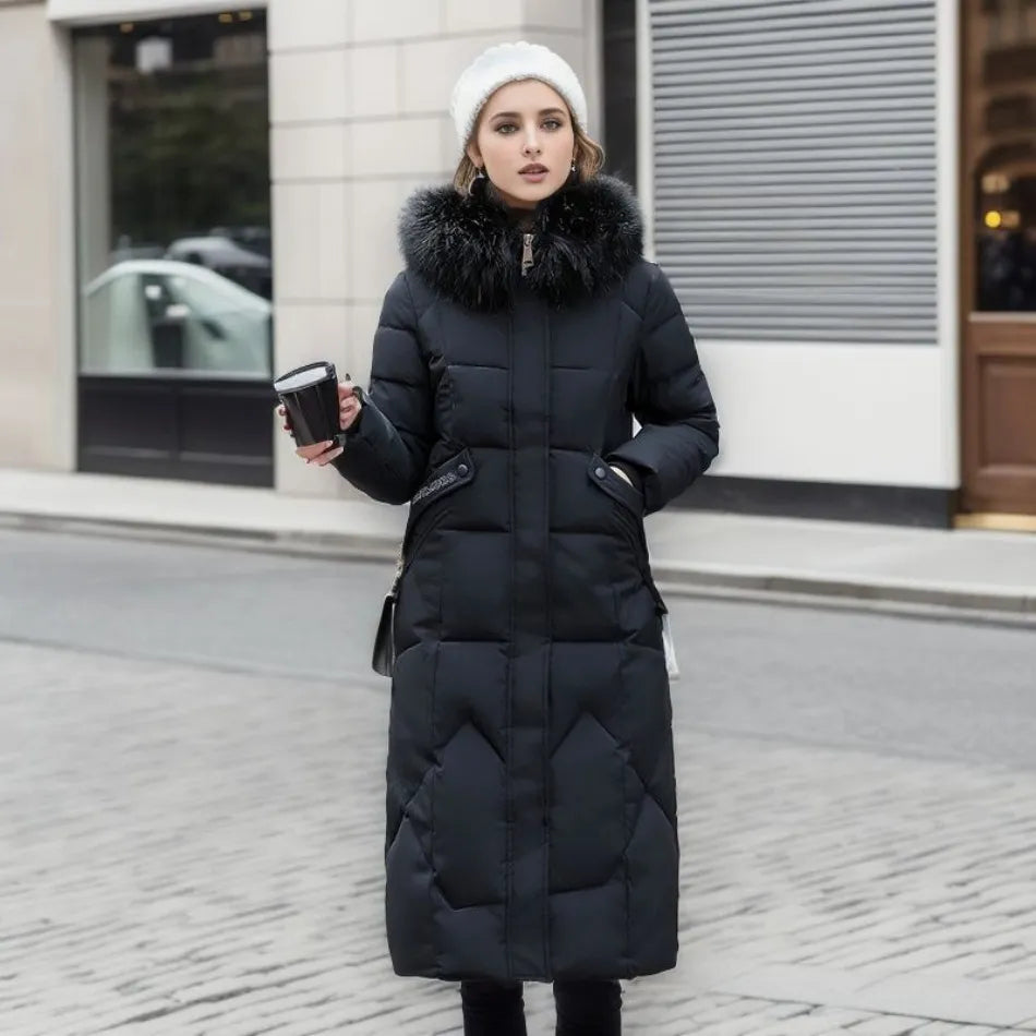 Front view of women's quilted winter coat, black, with a luxurious faux fur trimmed hood