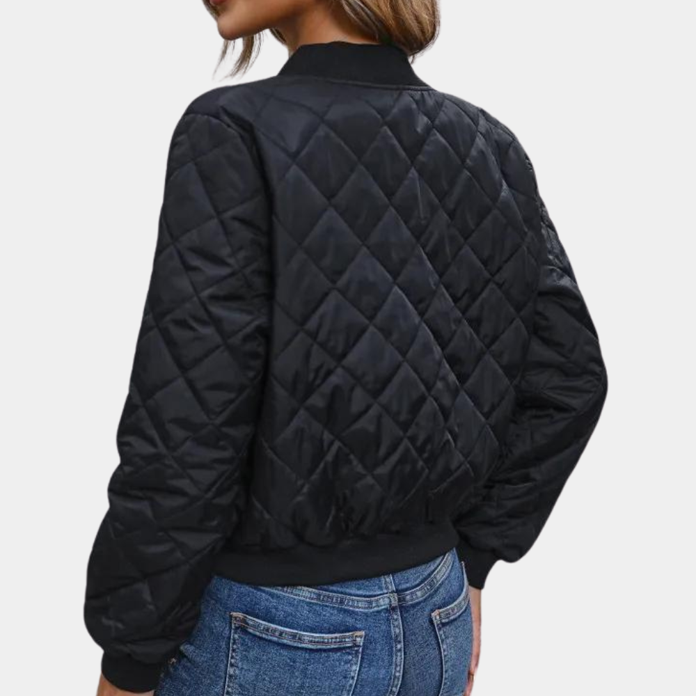 Casual women's black quilted bomber jacket with a zip-up front, perfect for streetwear and transitional weather.