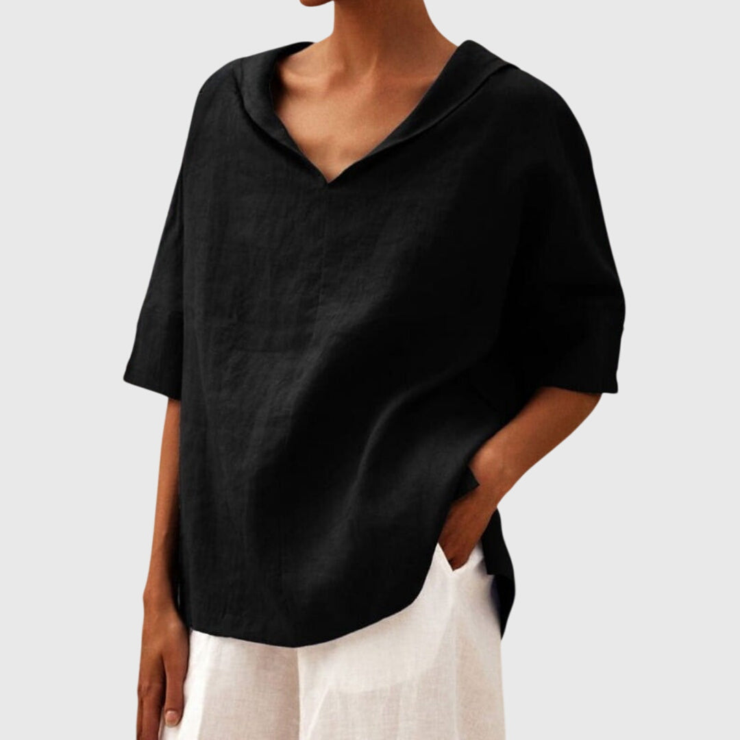 Women's black relaxed fit blouse, long sleeve. Perfect for everyday comfort and casual, versatile style.