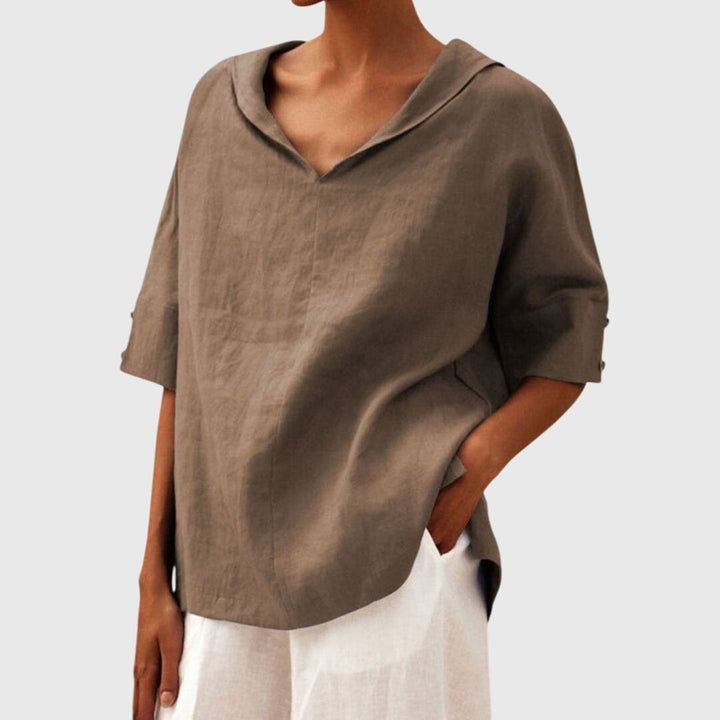 Khaki women's relaxed fit long sleeve blouse. Versatile top for everyday comfort and casual fashion.