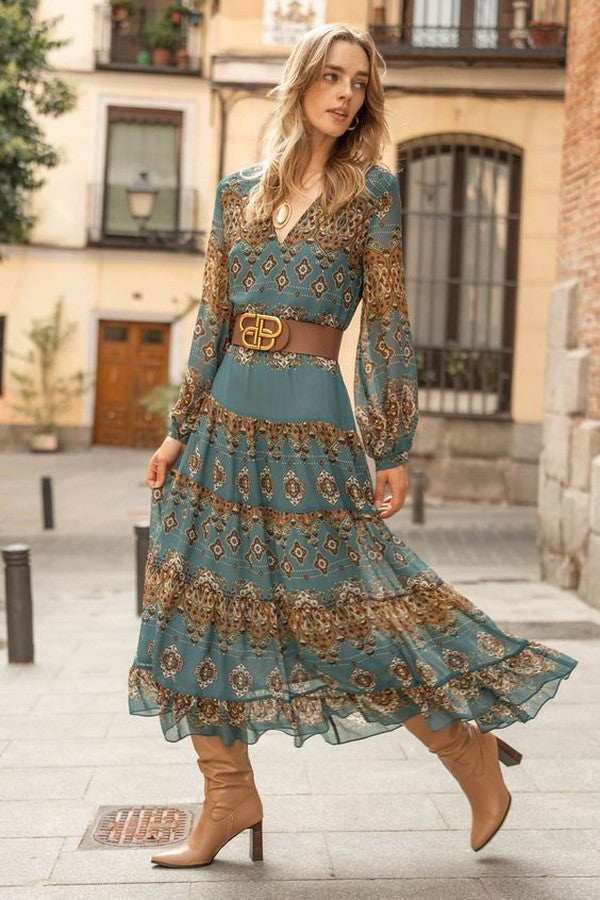 Women's blue boho medallion print midi dress with puff sleeves and tiered skirt. Casual, vintage-style fashion.