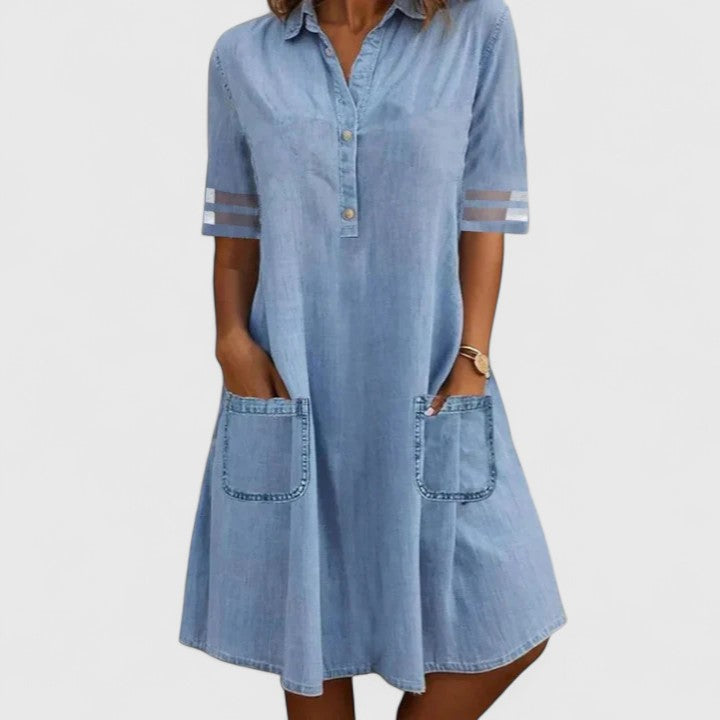 Women's blue denim casual dress with buttons & pockets. Figure-flattering design for summer & everyday wear.
