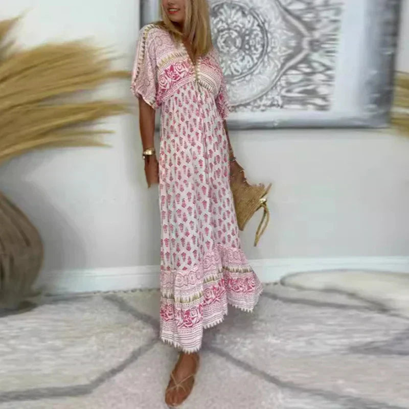 Flowy women's boho print maxi dress with v-neck, short sleeves. Stylish & comfortable for summer casual wear.
