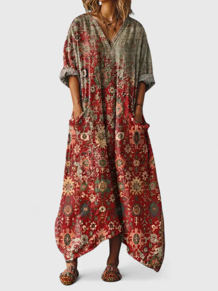 Vibrant bohemian print maxi dress for women with relaxed fit, v-neck, 3/4 sleeves & handy pockets.