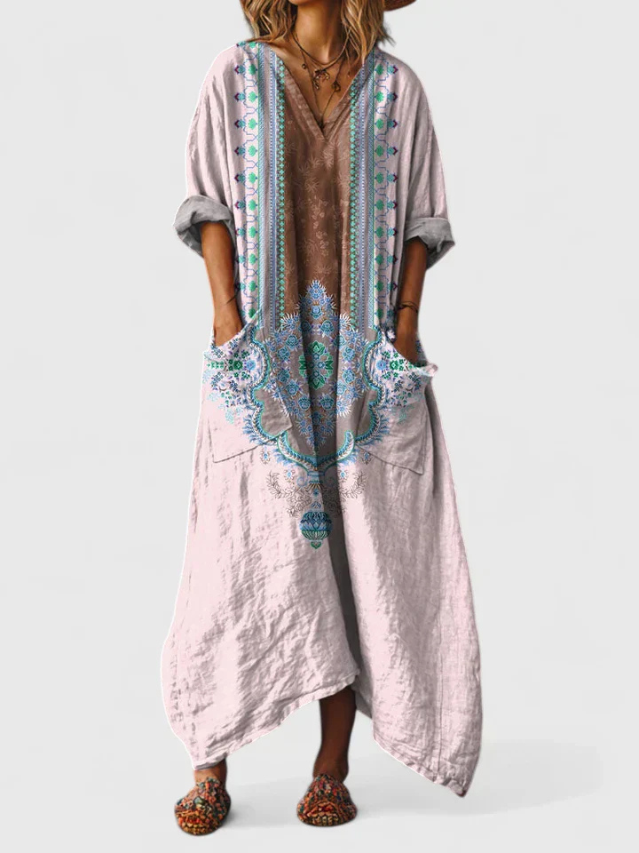 Comfortable women's maxi dress with a bohemian print, 3/4 sleeves, v-neck, and practical side pockets.