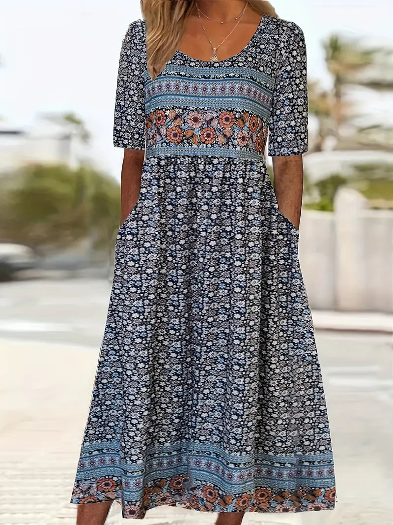 Bohemian style women's midi dress. Flowing print, short sleeves & practical pockets for casual comfort.