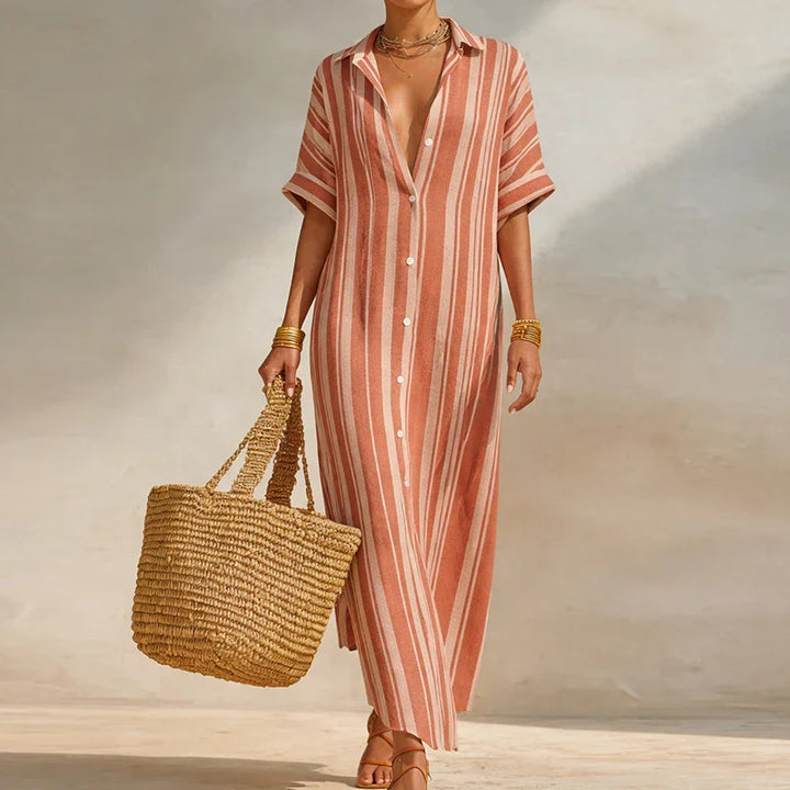 Effortless women's striped long summer dress with V-neck, ideal for a comfortable and breezy vacation style.