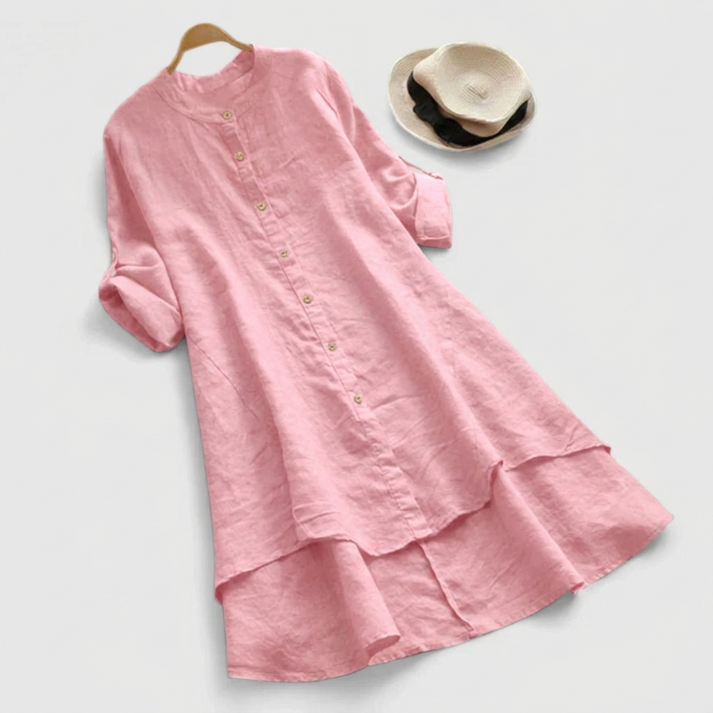 Comfortable women's long sleeve midi shirt dress. Features button-down front & unique layered hem for versatile style.