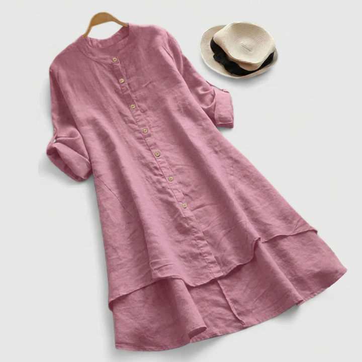 Elegant women's button-down midi shirt dress featuring a chic layered hem. Versatile long sleeve for all-season fashion.