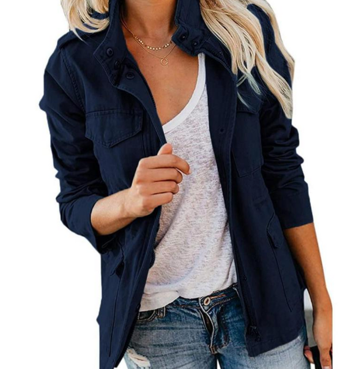 Durable women's cargo jacket in a timeless shade, featuring many pockets for essential storage & everyday utility.