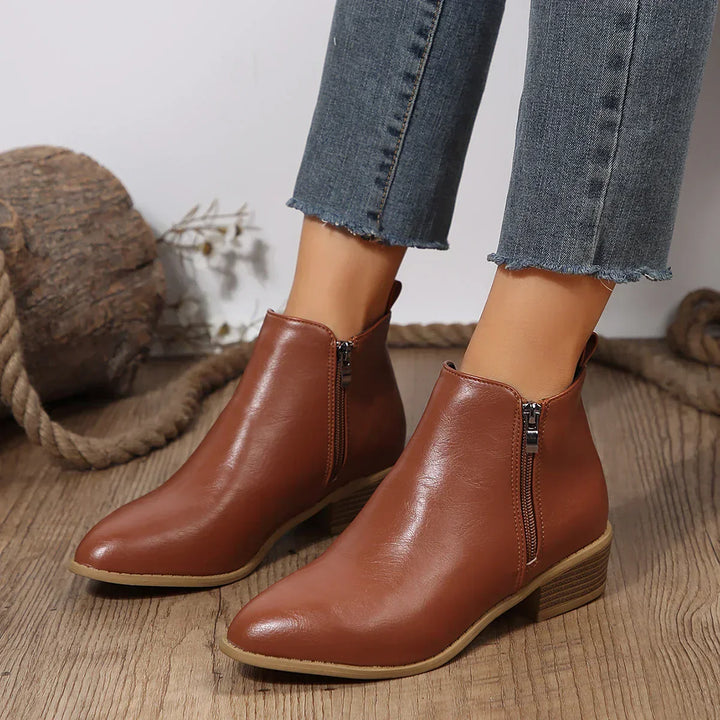 Fashionable women's casual ankle boots featuring a convenient side zipper detail