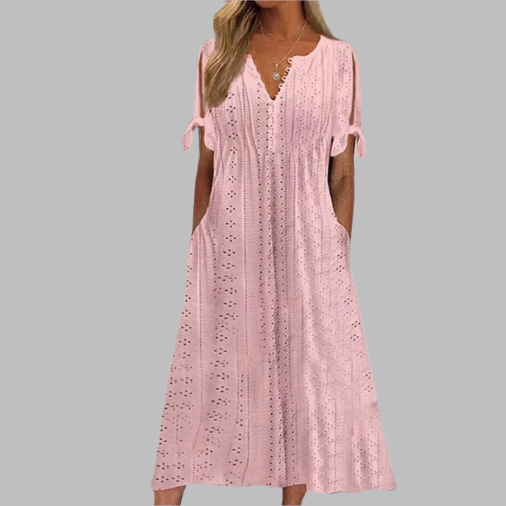 Comfortable women's casual midi dress, eyelet boho style, with V-neck, A-line, and practical pockets for summer.