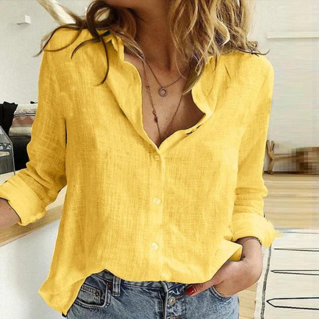 Women's casual button-down blouse with charming bird print. Long sleeve, relaxed fit, perfect for everyday fashion.