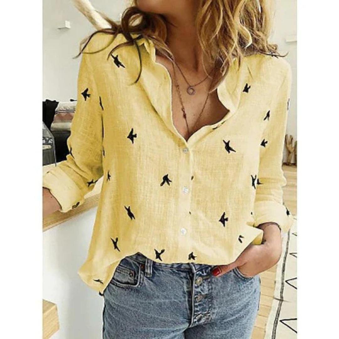 Women's casual long sleeve blouse. Button-down front with a charming bird print, perfect for fashion and comfort wear.
