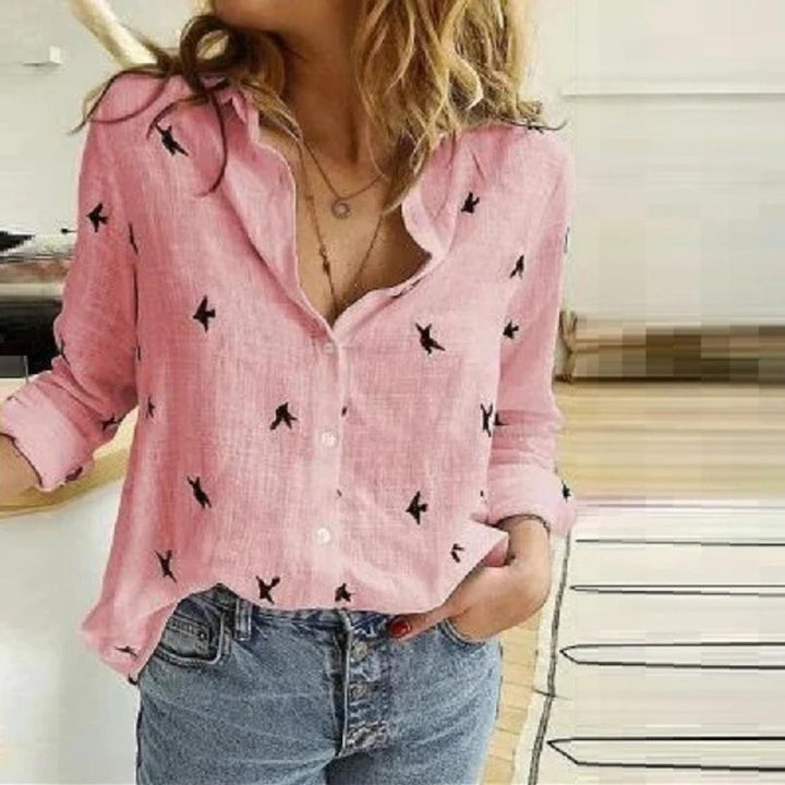 Women's button-down blouse with charming bird print. Casual long sleeve top, relaxed fit for versatile everyday wear.