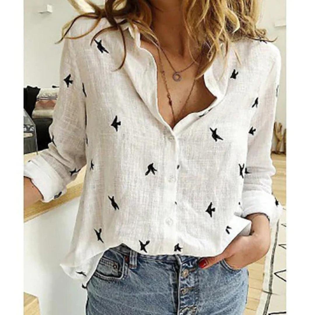 Relaxed fit women's casual button-down blouse, long sleeve with a charming bird print. Ideal everyday fashion top.