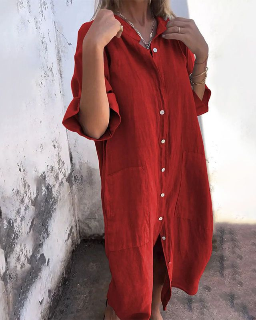 Versatile women's button-front shirt dress with pockets, designed for a relaxed fit and all-day comfort.