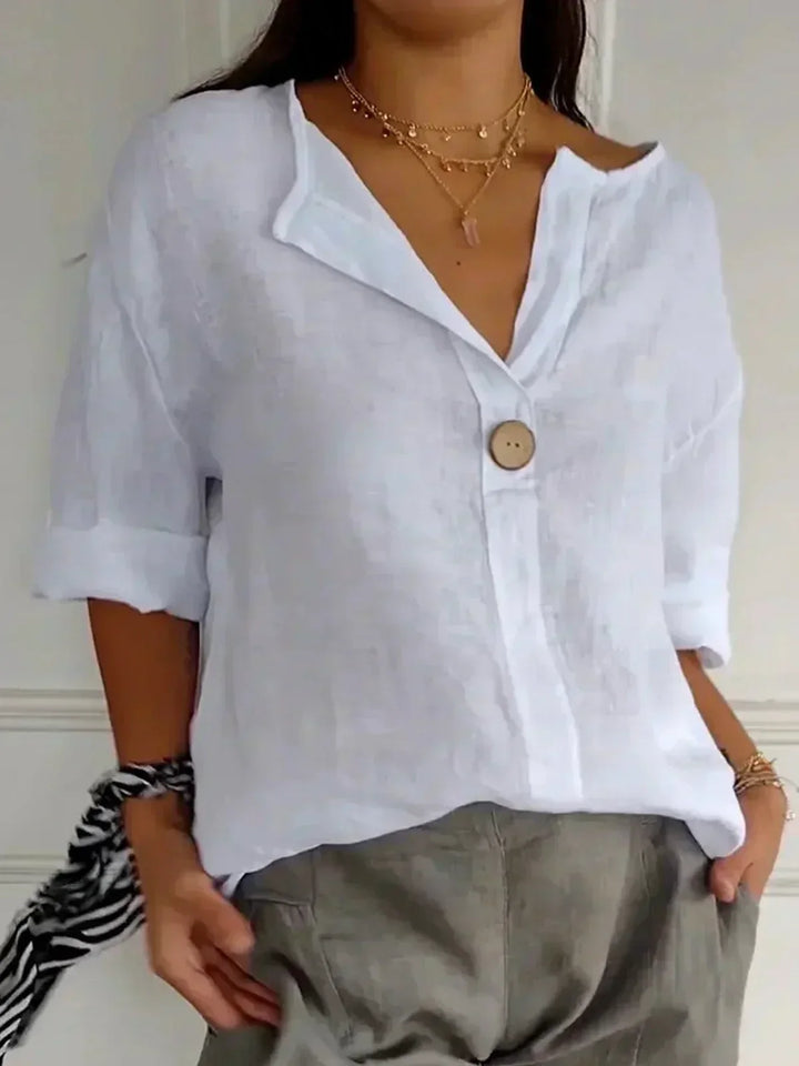 Women's button-front V-neck tunic blouse, 3/4 sleeve. Casual, versatile summer top for effortless style.