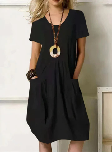 Comfortable women's gathered midi dress with pockets, perfect for versatile summer fashion & everyday wear in rust.