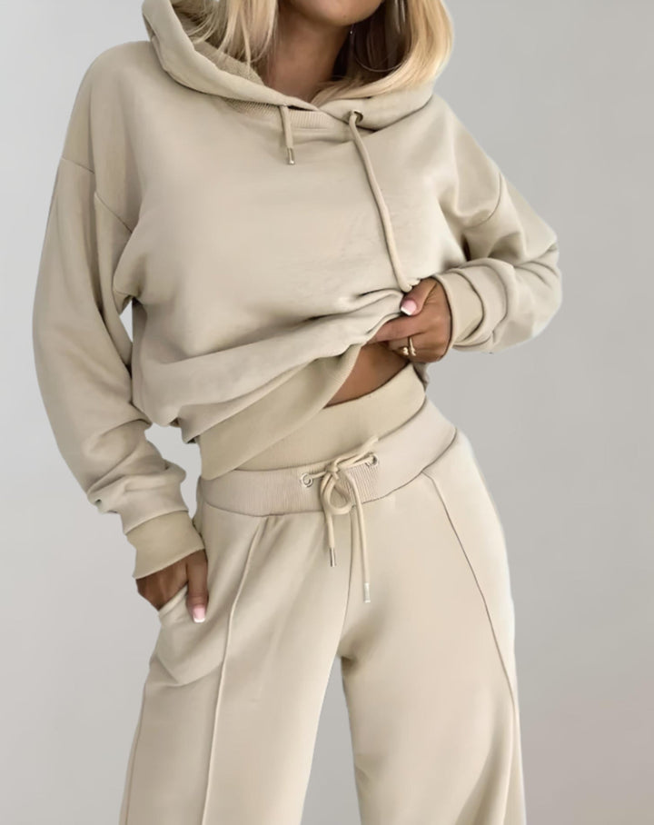 Relaxed fit women's hoodie and tracksuit set, a versatile and comfortable matching outfit for casual wear.