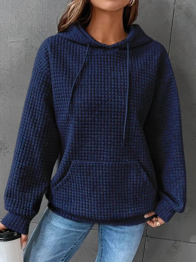 Comfortable women's long-sleeve hooded top, ideal for spring casual outfits