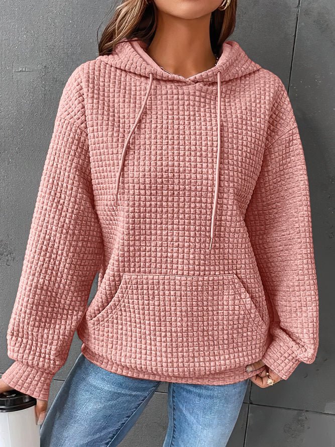 Spring-ready women's casual hooded top, offering comfort and style