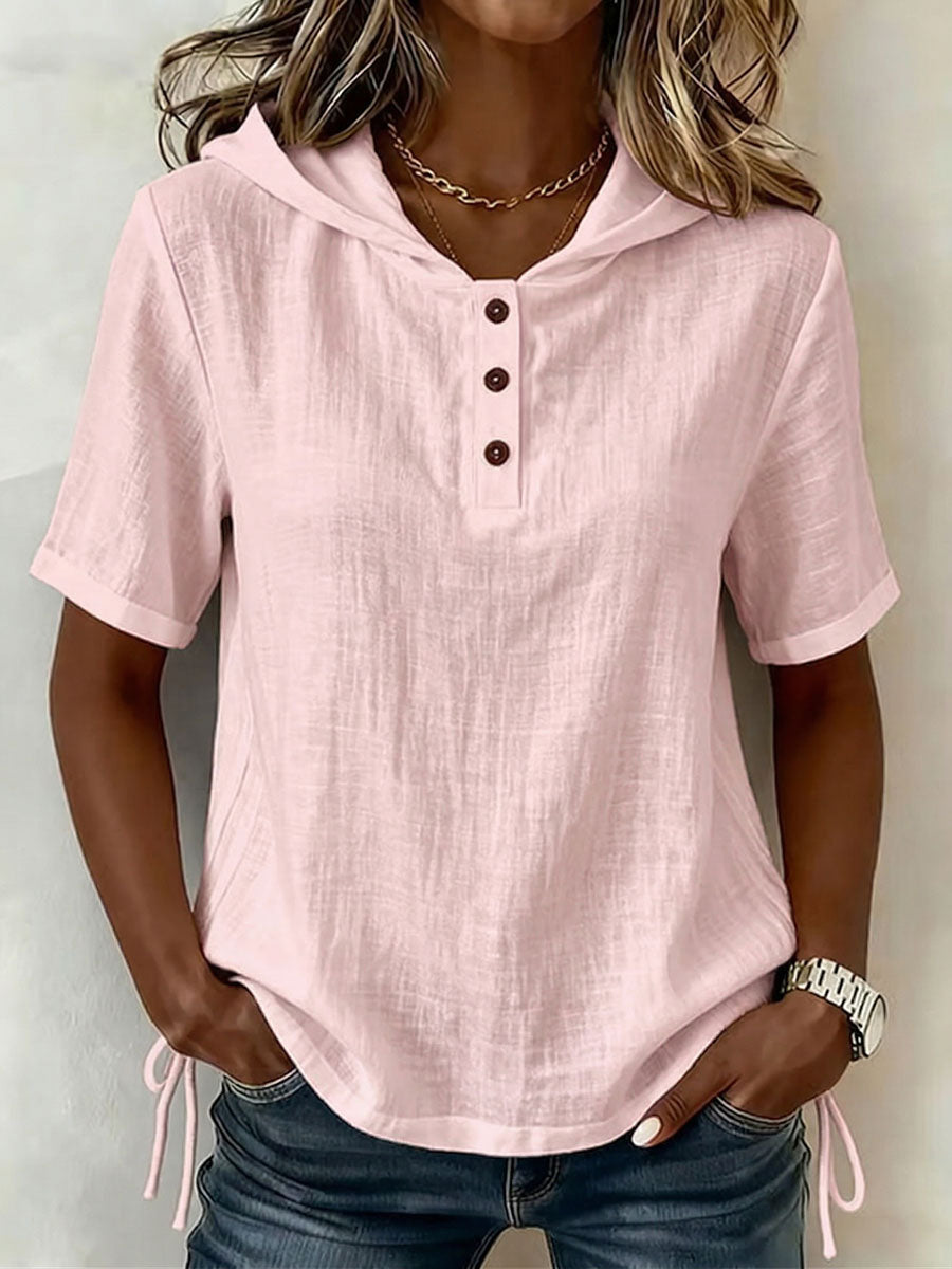 Relaxed fit women's long-sleeve hooded shirt, casual button top for comfortable everyday spring style.