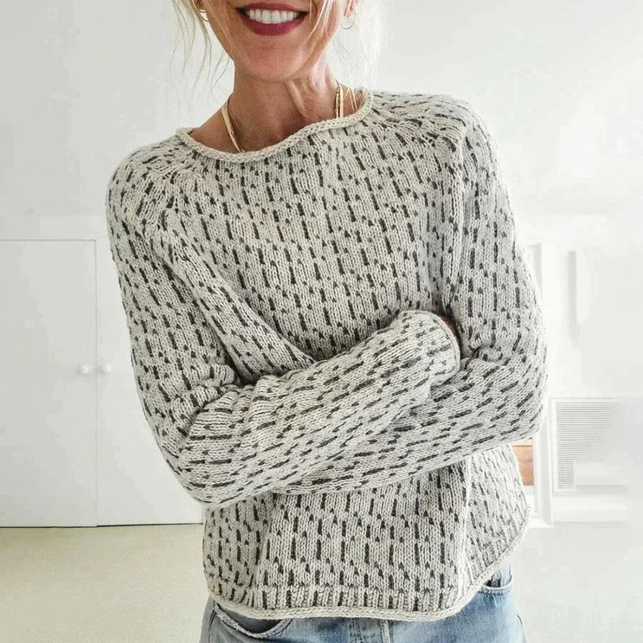 Women's casual knit boat neck sweater in a relaxed fit, perfect for everyday comfort and style.