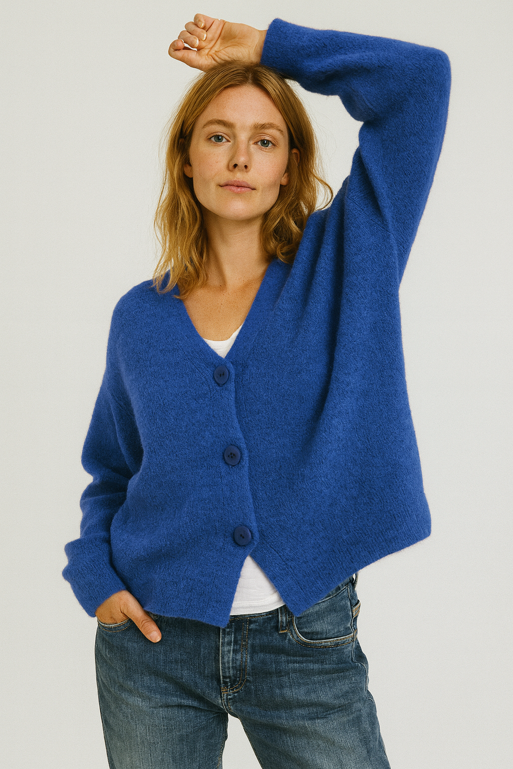Soft, lightweight women's spring cardigan with functional buttons, ideal for versatile fashion.