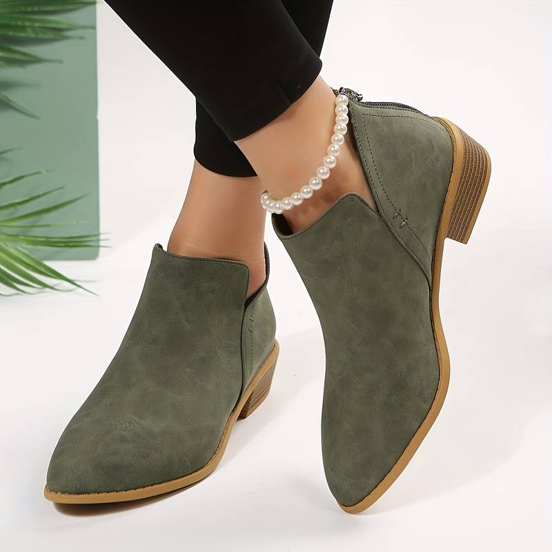Women's casual low heel slip-on ankle boots, perfect for comfortable everyday fall and winter wear.