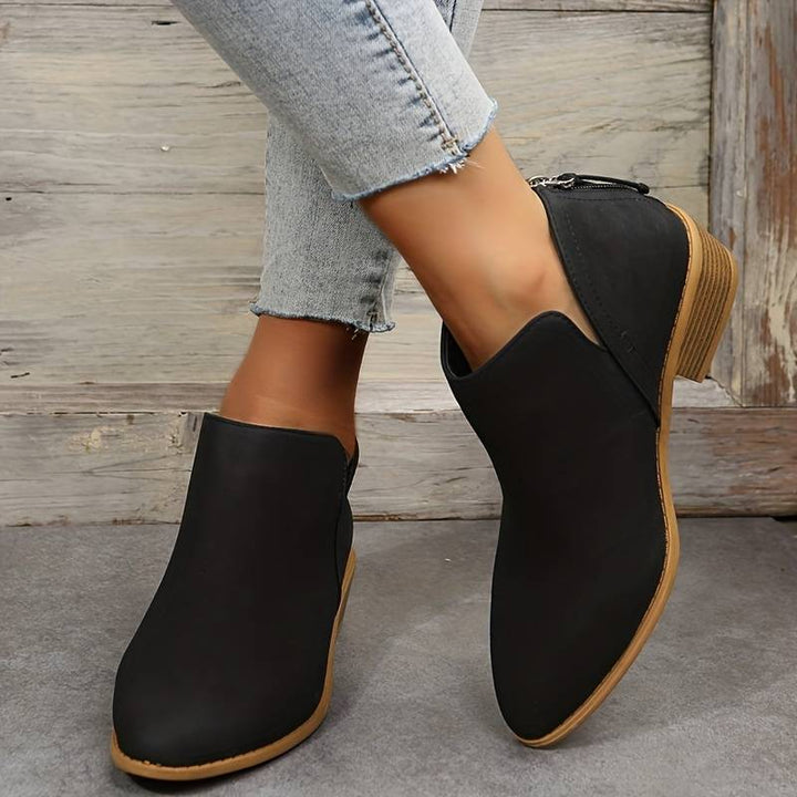 Stylish women's casual low heel slip-on boots, a must-have for fall fashion and versatile use.