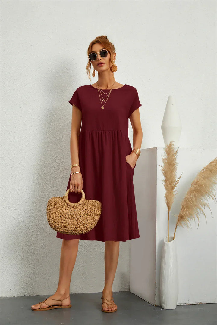 Soft, loose fit women's casual midi dress with pockets, short sleeve, and stylish for spring/summer.