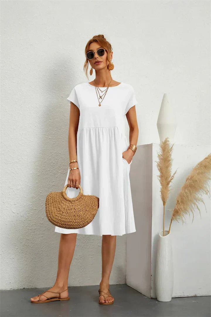Women's fashion casual midi dress, short sleeve with pockets, tiered, and comfortable for everyday chic.