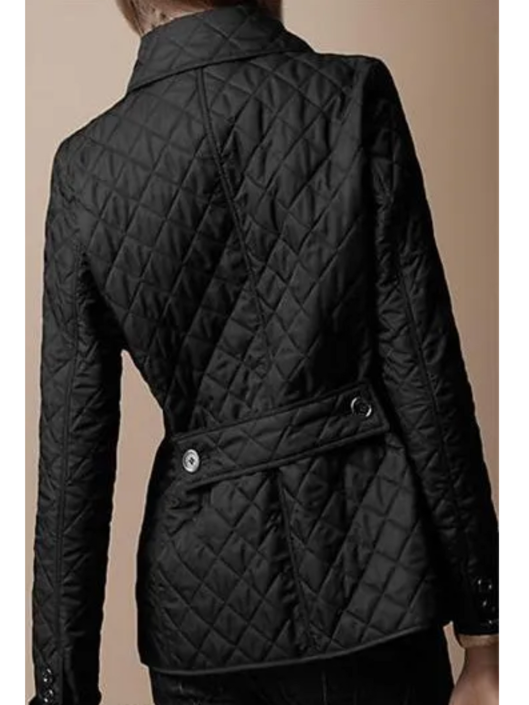 Stylish women's quilted jacket featuring a chic turned-down collar & snap buttons, ideal for casual outerwear.