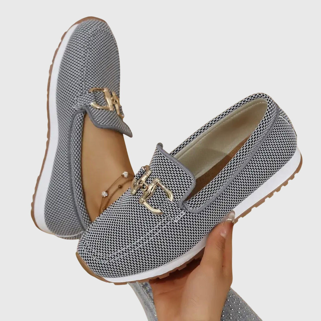 Front view of women's casual loafers, a perfect comfortable slip-on shoe for spring