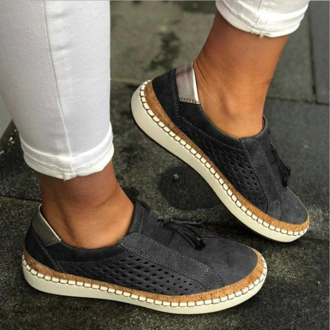 Side view of women's comfortable loafers, showcasing a low-profile design for flats.