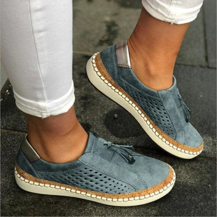 Pair of women's casual slip-on shoes, ready for all-day wear and spring fashion.