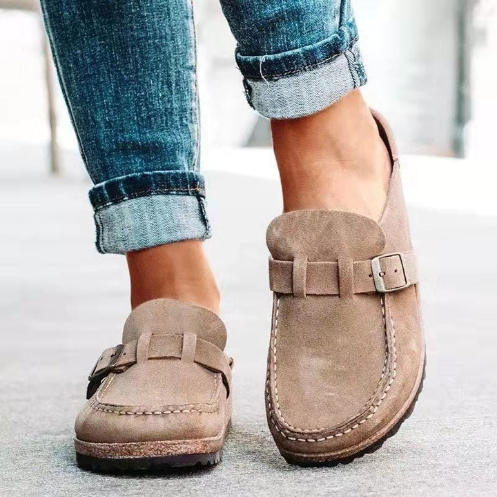 Everyday comfort: Women's slip-on loafers with a prominent buckle, great for casual wear.