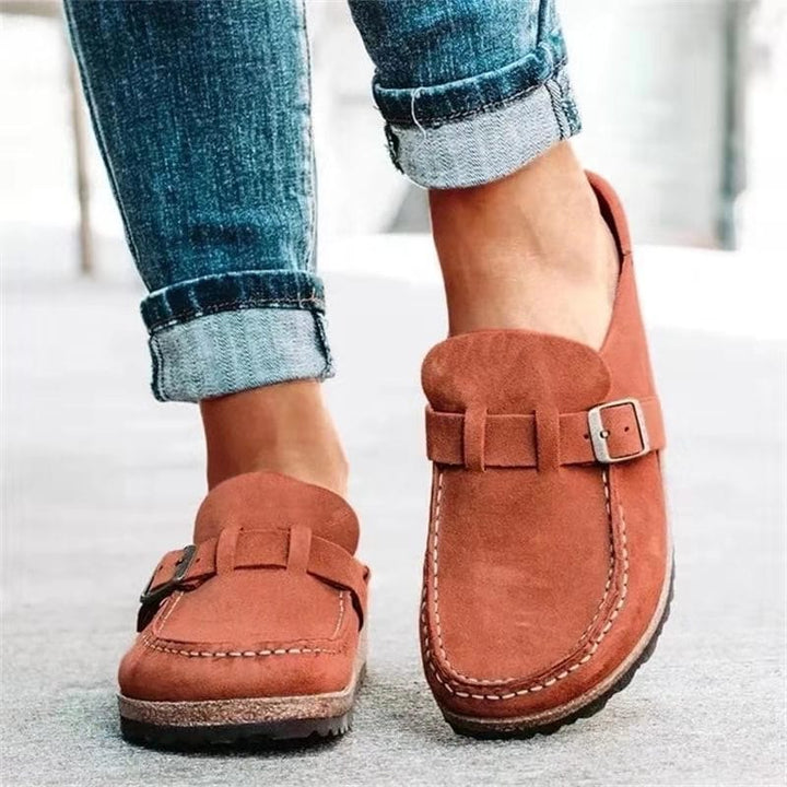 Versatile women's loafers with a chic buckle accent, easy to slip on for any casual occasion.