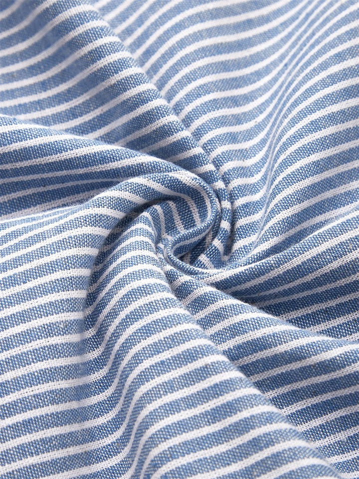 Stylish women's pleated A-line midi dress with stripes, perfect as a casual day or spring/summer dress.