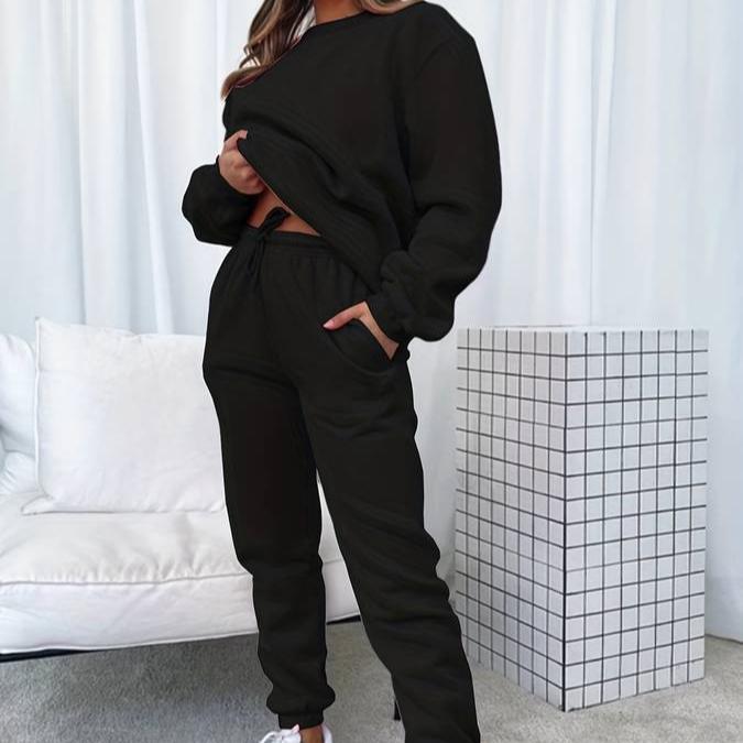 Women's casual sweatshirt and jogger lounge set in soft grey, perfect for comfortable loungewear.