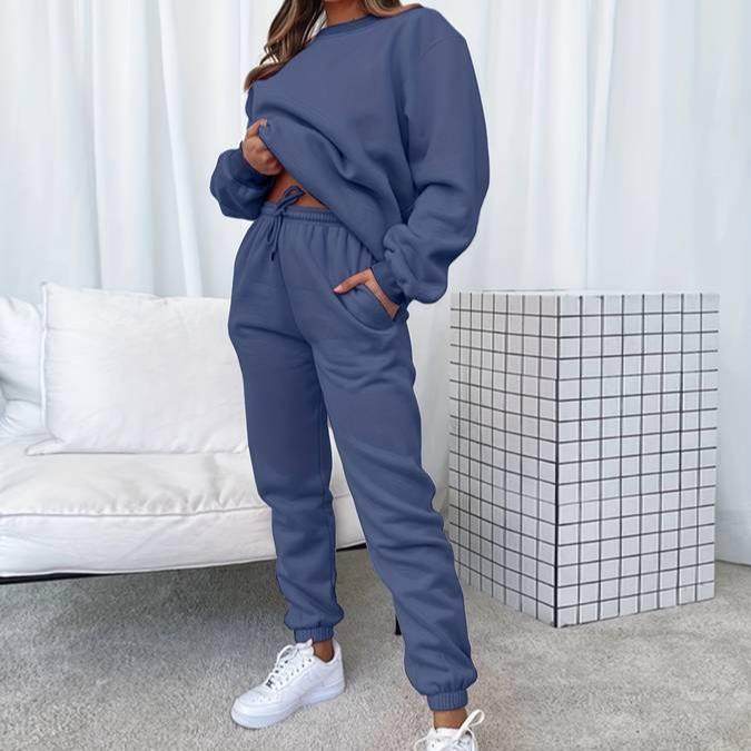 Cozy women's apparel: two-piece sweatshirt and jogger set in a relaxed fit.