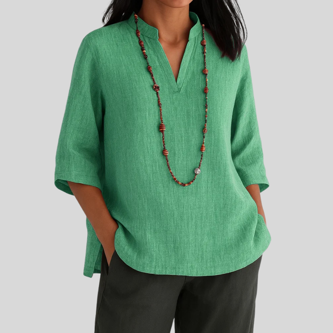 Women's casual V-neck blouse with 3/4 sleeves, relaxed fit, perfect for comfortable everyday wear or office.